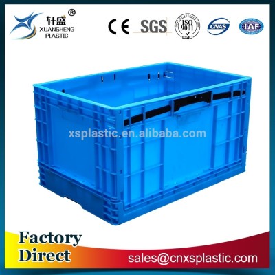 Solid plastic foldable container for industrial use